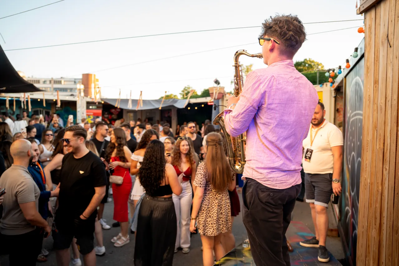 Golden hour set over the crowd at an open-air club